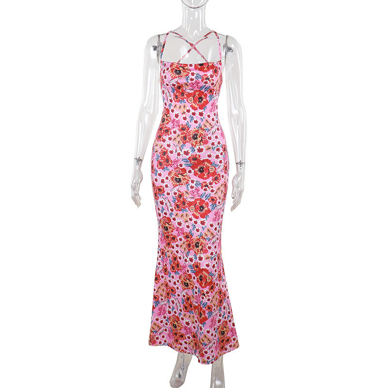 Elegante nauwsluitende cami jurk met een vrolijke print