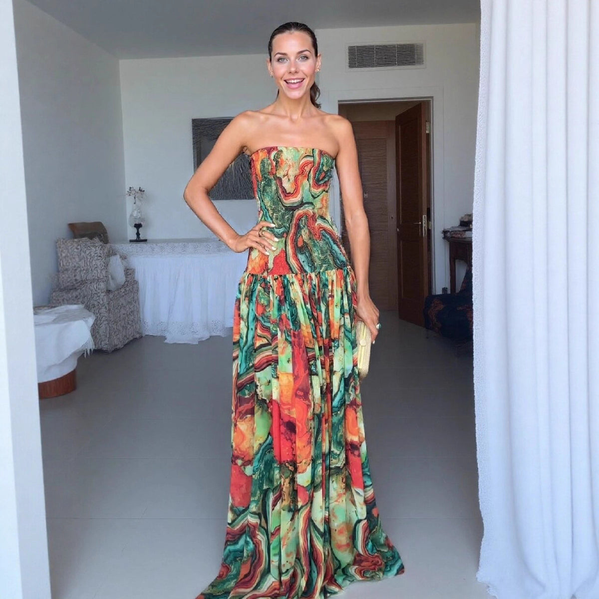 Elegante bedrukte aansluitende strapless maxi-jurk met elastische lijf en uitlopende rok