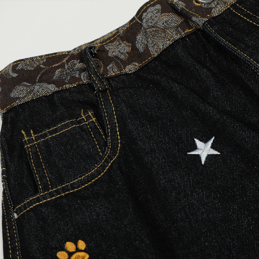 Jeans met gebogen mes vorm en geborduurd sterrenhemelmotief