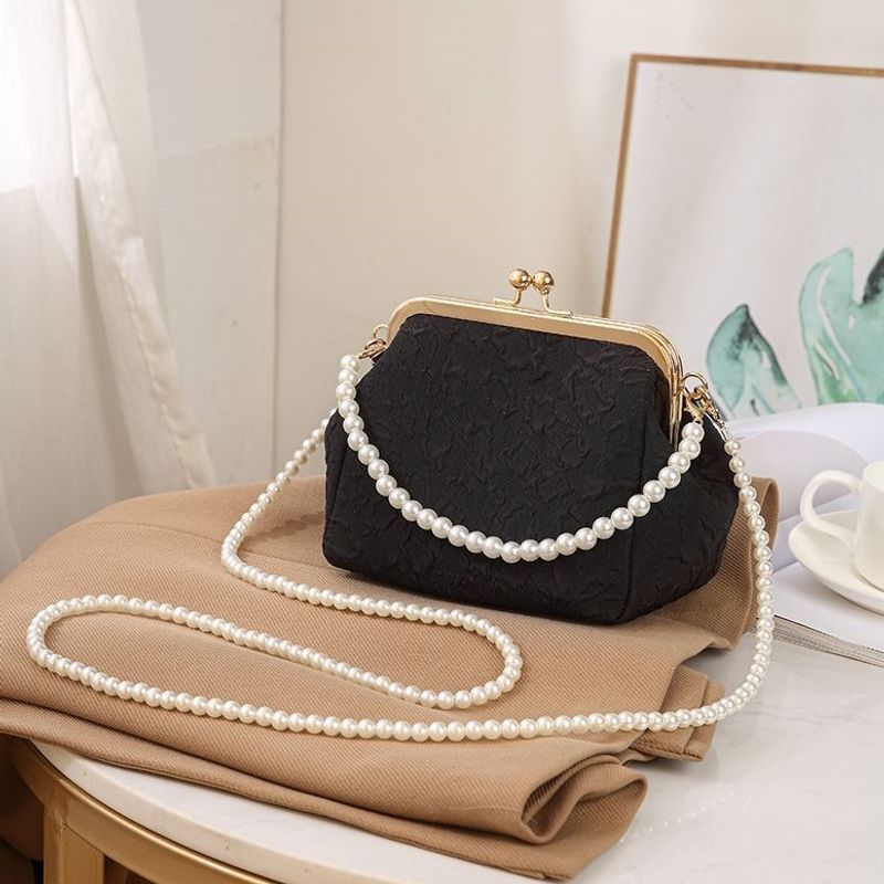Mini shell-shaped jewelry charm handbag made
