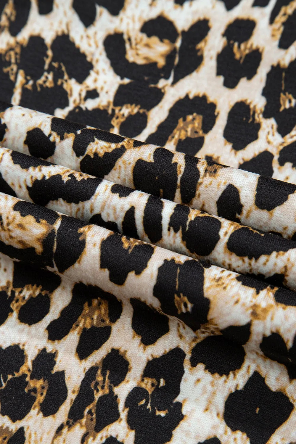 Mouwloze maxi-jurk met luipaardprint en zijsplit