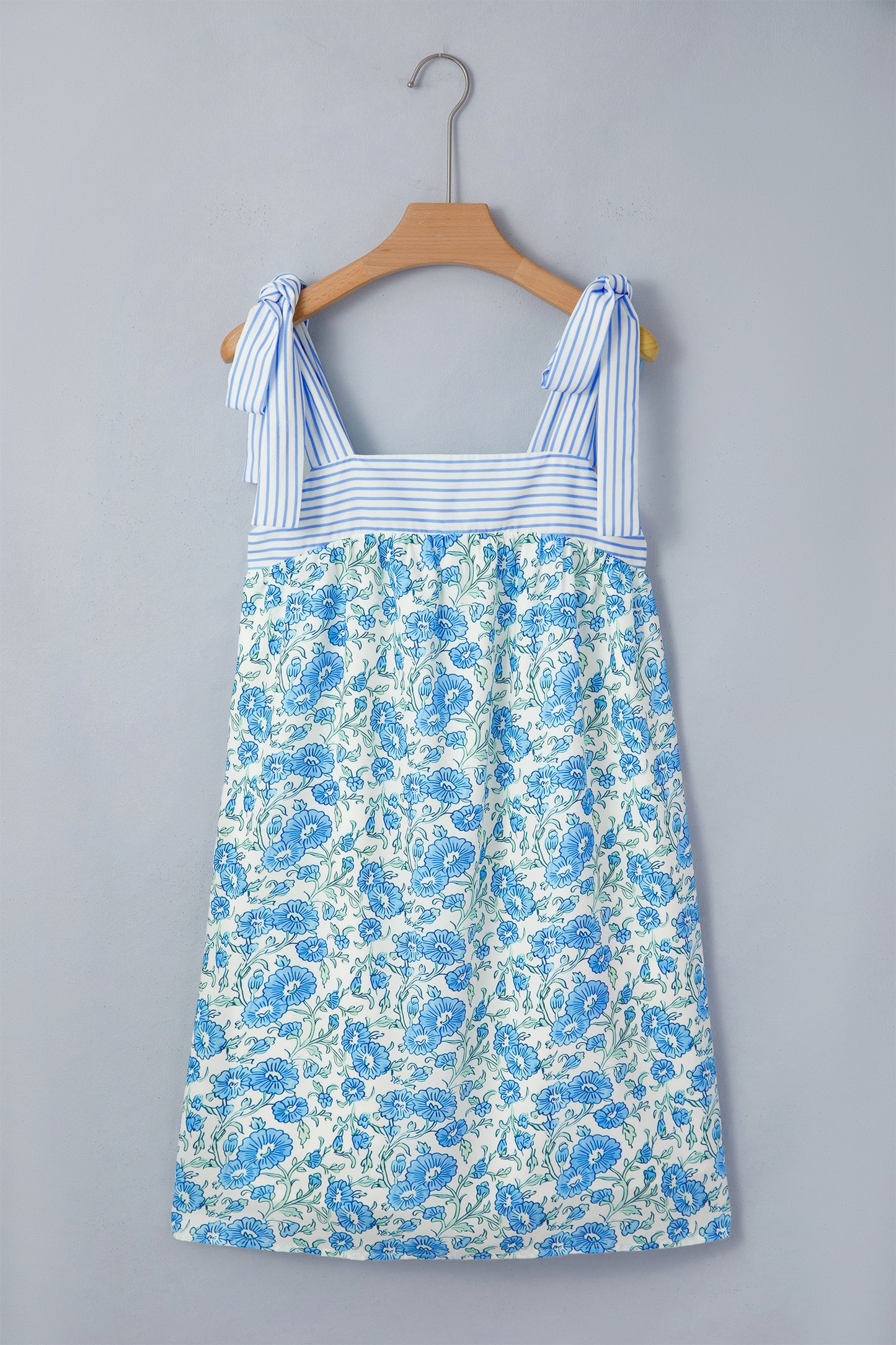 Mini-jurk met bloemenprint strepen patchwork en strikbandjes