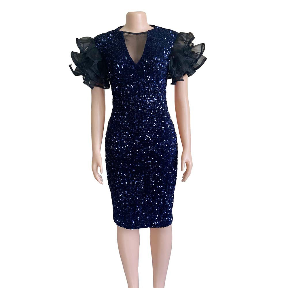 Midi-jurk met pailletten en mesh pofmouwen