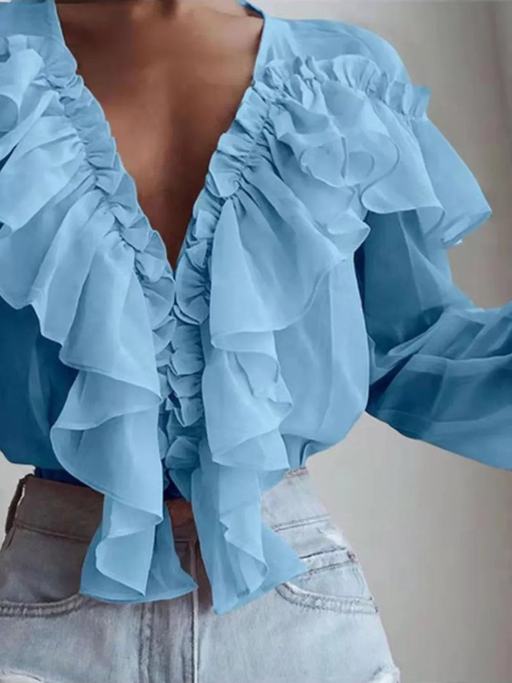 Blouse met ruches en lange mouwen en V-hals