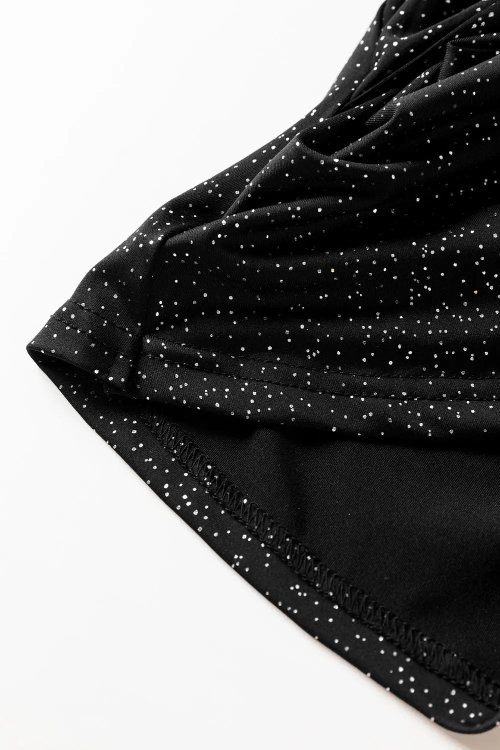 Glitterblouse met lange mouwen en overslag