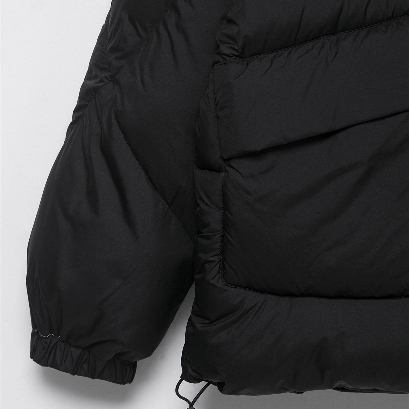 Effen donsjas met capuchon zakken trekkoord en ritssluiting