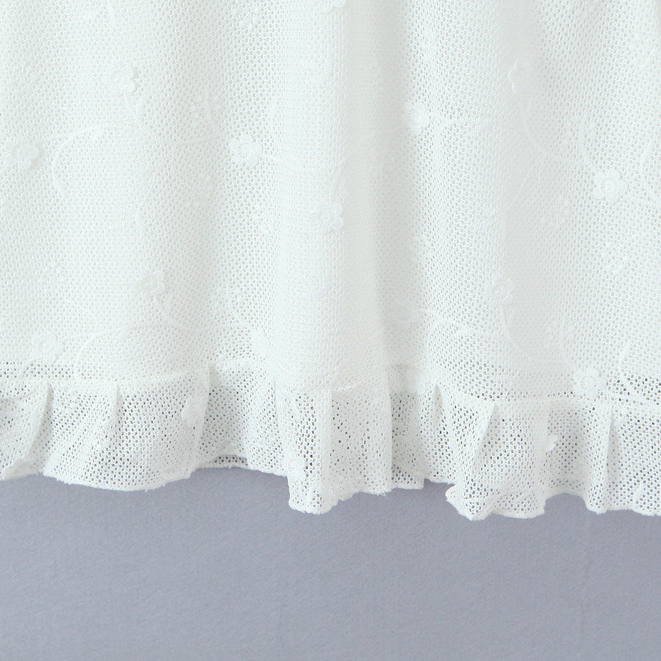 Veelzijdige mouwloze jurk van mesh met borduursels en vetersluiting