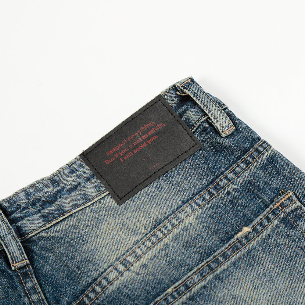 Geschuurde witte gewassen rechte denim jeans