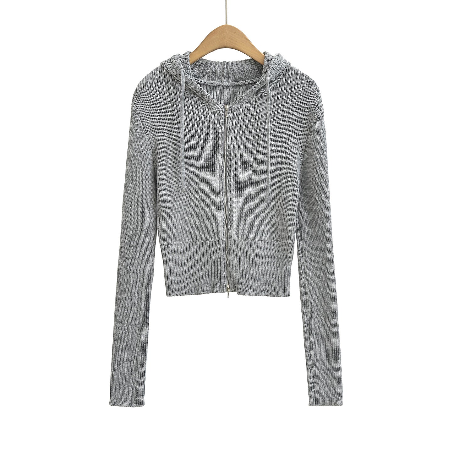 Gebreide vest met capuchon voorzien van trekkoord dubbele ritssluiting en lange mouwen