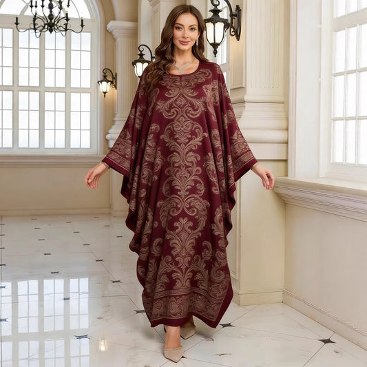 Lange jurk met geometrische print en vleermuismouwen