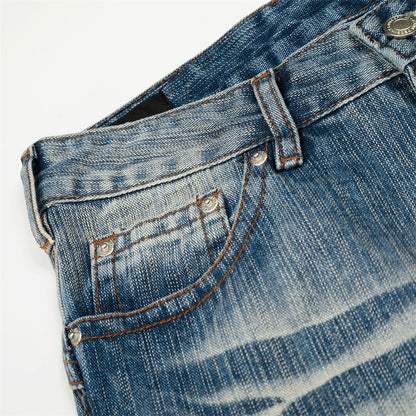 Witgewassen denim jeans in gebogen mes vorm