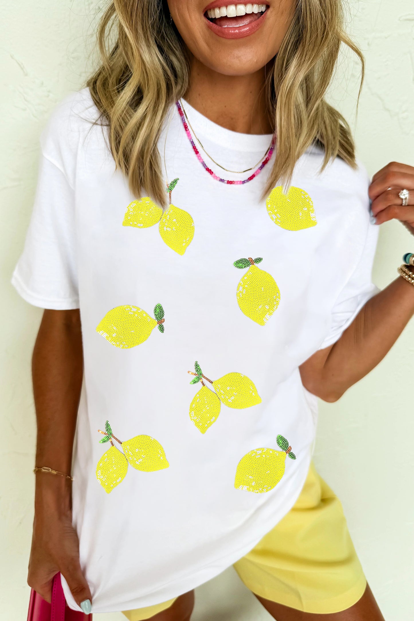 Witte zomerse casual T-shirt met pailletten en citroenprint