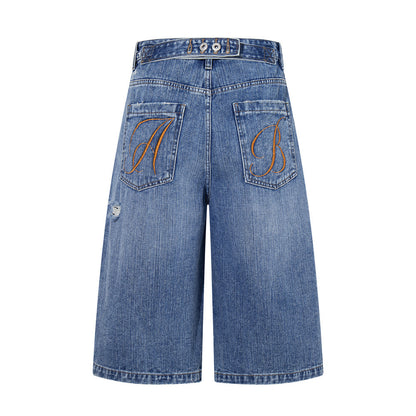 Ripped denim shorts
