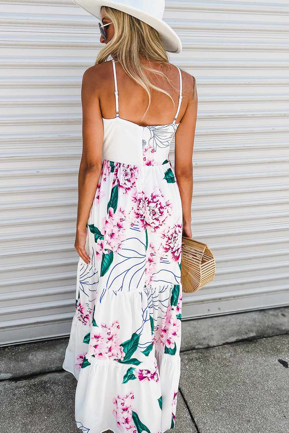 Witte maxi-jurk met bloemenprint uitsnijdingen en verstelbare bandjes