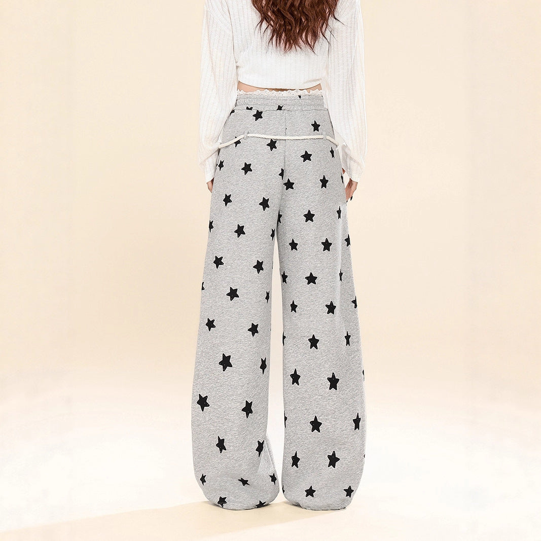 Dames joggingbroek met all-over sterren print wijde pijpen in een relaxte stijl