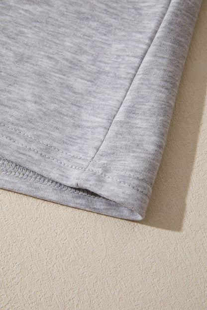Lichtgrijze oversized T-shirt met patchworkdetails en onafgewerkte randen