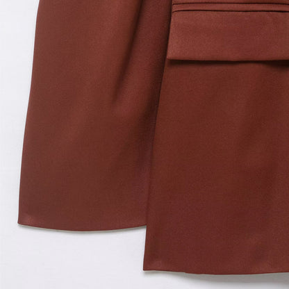 Elegant colbert in vintage stijl met striksluiting en wijde schouders