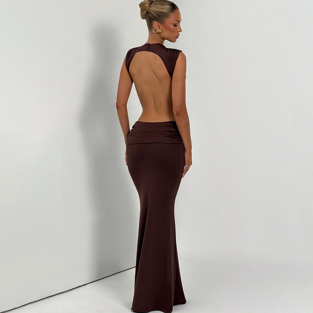 Mouwloze maxi-jurk met hoge hals lage taille uitsnijding en blote rug