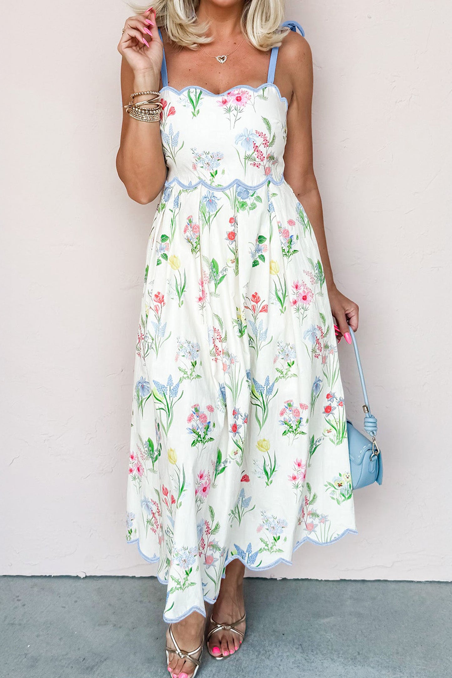 Roze midi-jurk met bloemenprint contrasterende bies strikbandjes en hoge taille