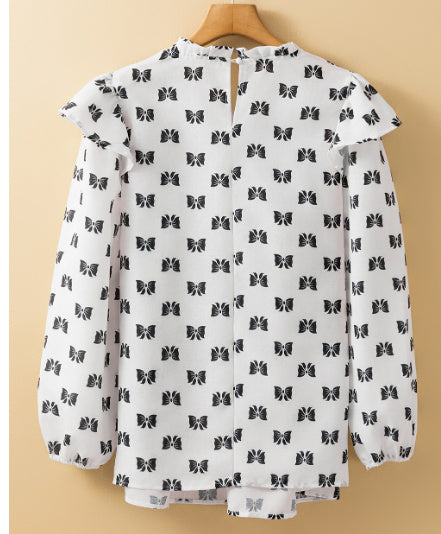 Witte blouse met bies strikprint en ronde hals