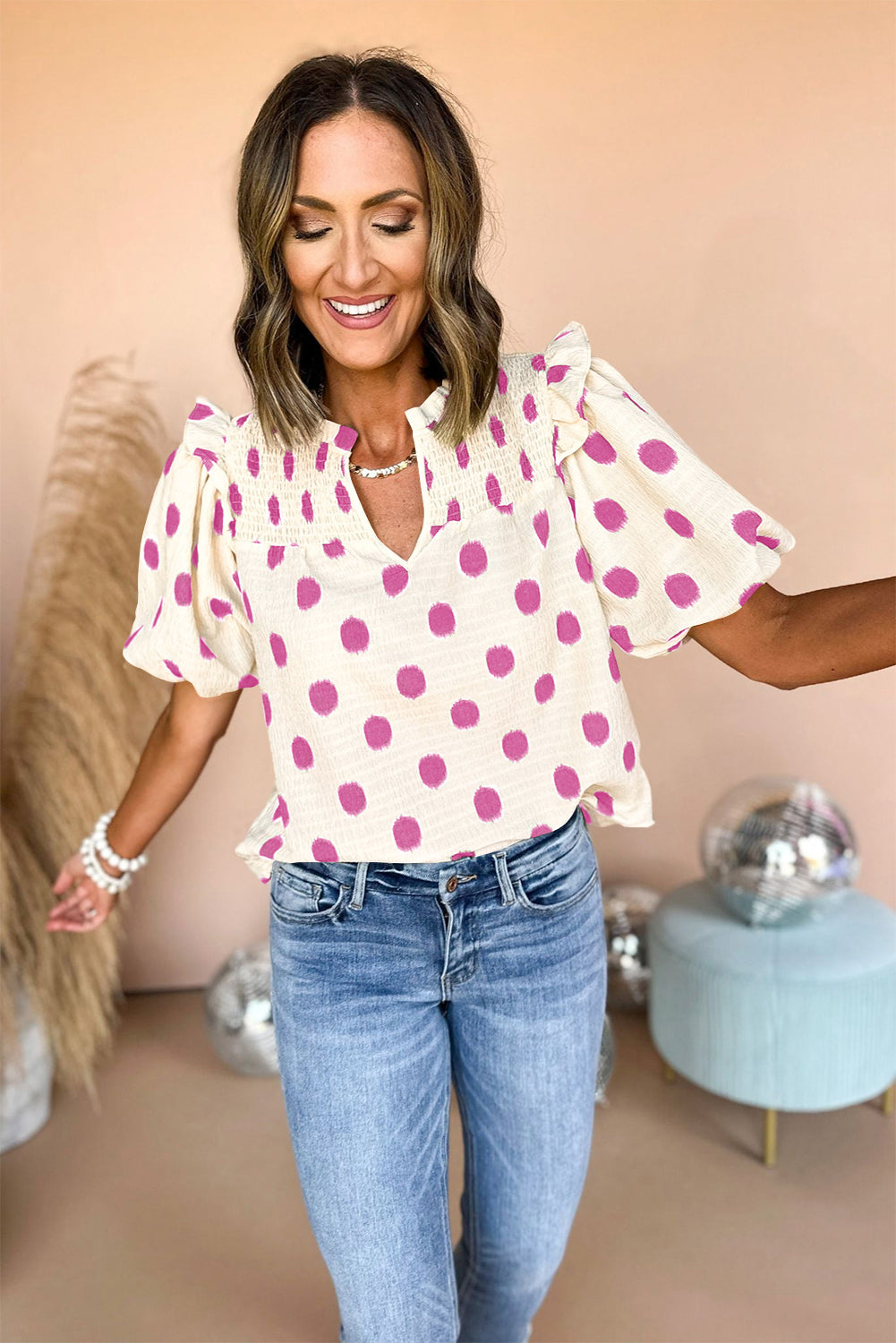 Blouse met stippenprint gesmokte halslijn en korte ballonmouwen