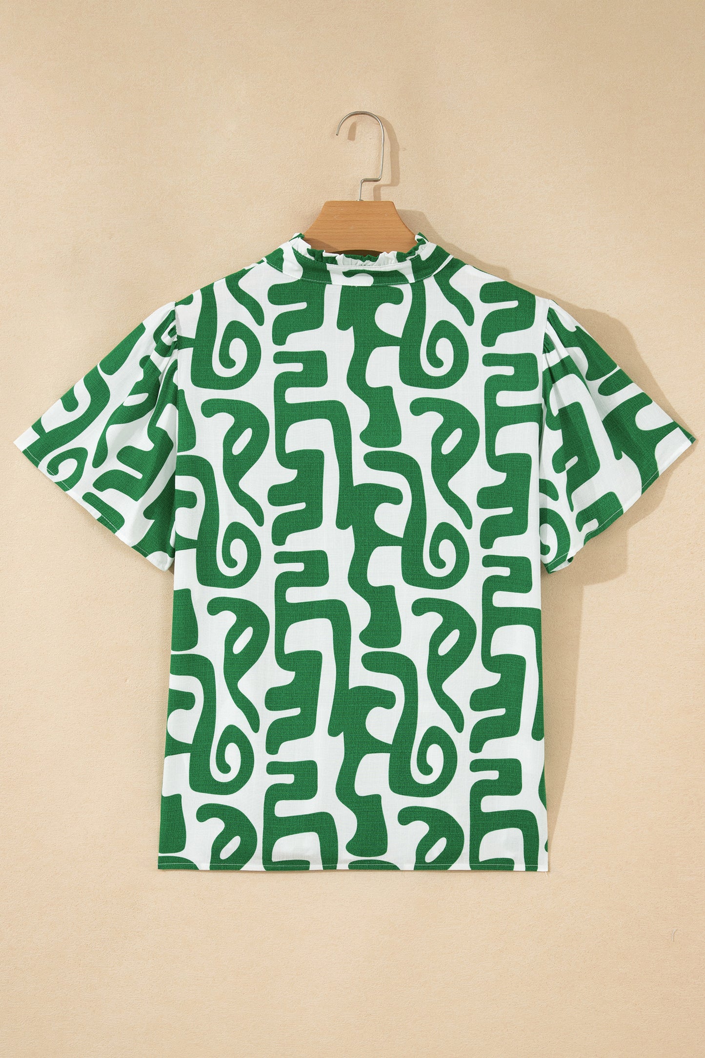 Groene blouse met abstracte print strepen V-hals en korte mouwen