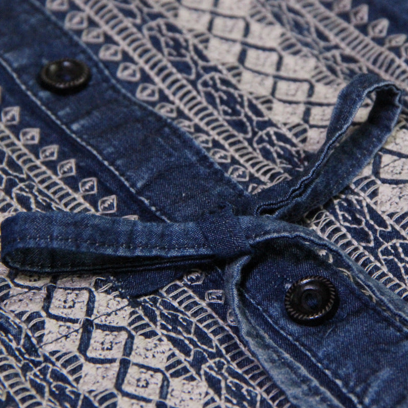 Geborduurde denim jurk