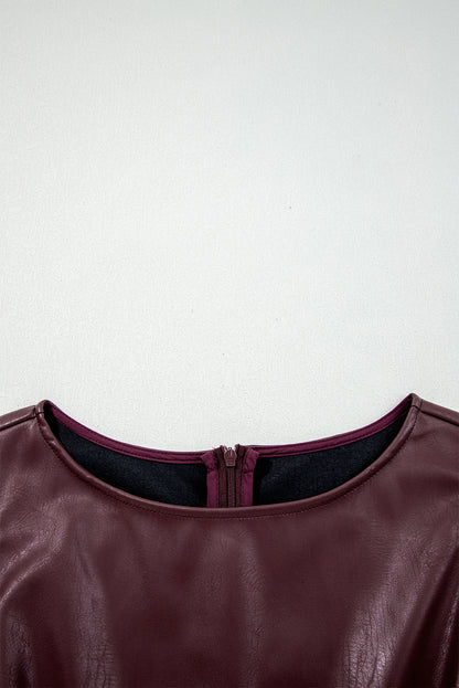 Mouwloze mini-jurk met ronde hals van imitatieleer