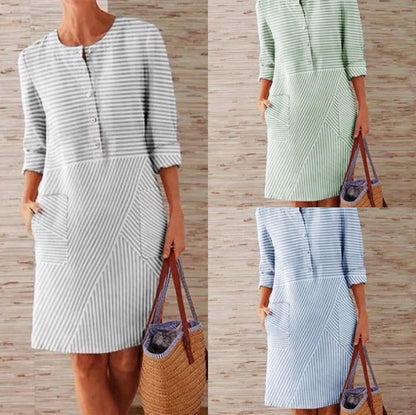 Gestreepte midi-jurk met knoopjes en zakken