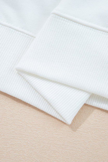 Preppy sweatshirt met strepen op de mouwen en een losse pasvorm