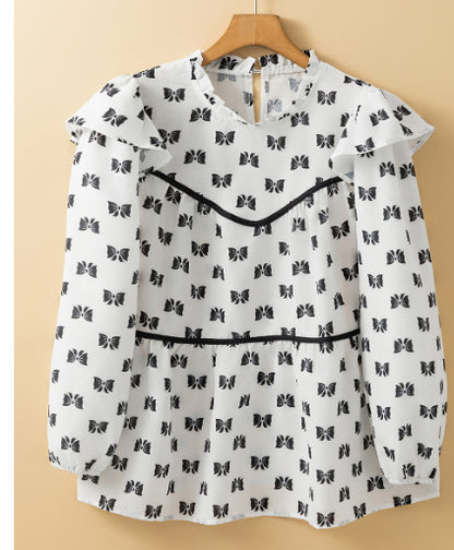 Witte blouse met bies strikprint en ronde hals