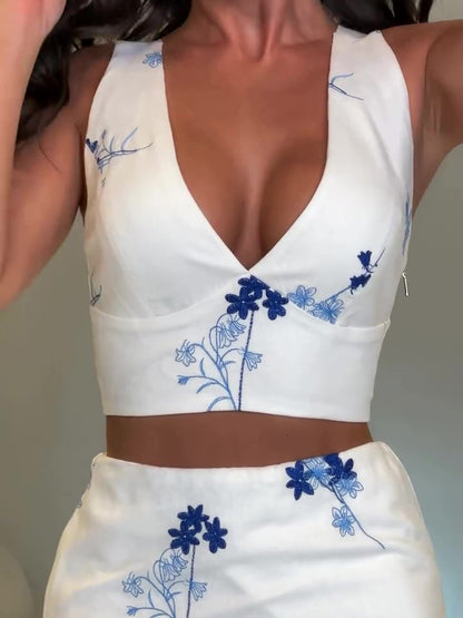 Set van vest met V-hals  en rok met bloemenmotief