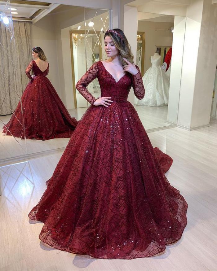 Lange kanten galajurk met lange mouwen en diepen V-hals