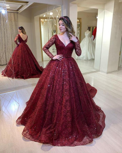 Lange kanten galajurk met lange mouwen en diepen V-hals