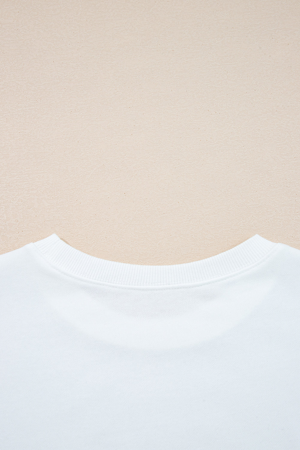 Preppy sweatshirt met strepen op de mouwen en een losse pasvorm