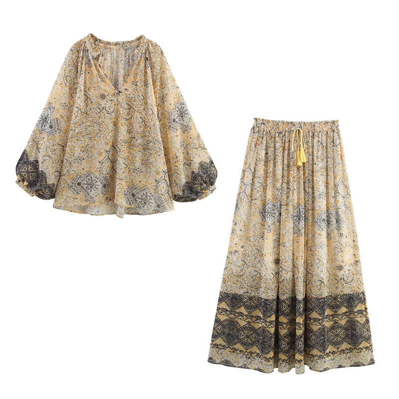 Elegant vormgegeven shirttop of midi-rok met print