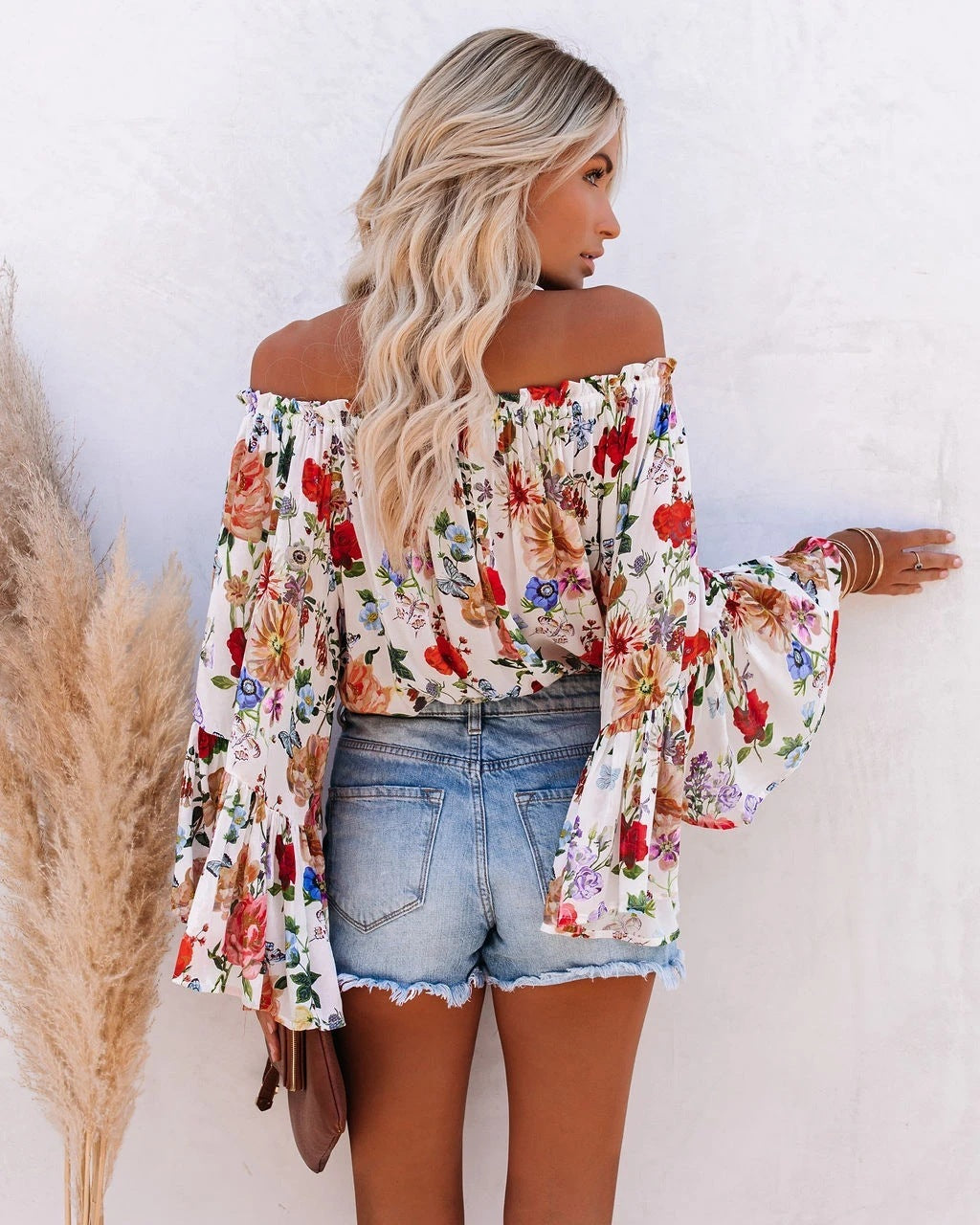 Bedrukte off-shoulder blouse met uitlopende mouwen