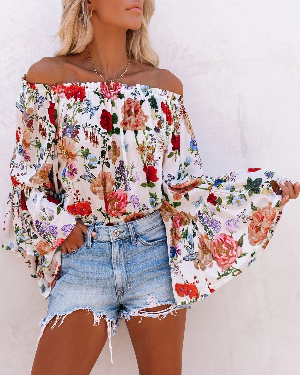 Bedrukte off-shoulder blouse met uitlopende mouwen