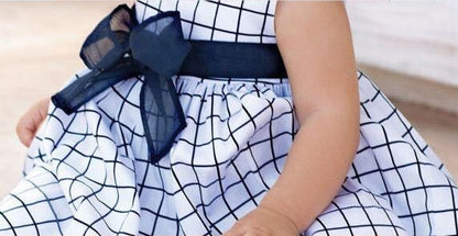 Baby blauwe geruite jurk met strikrok