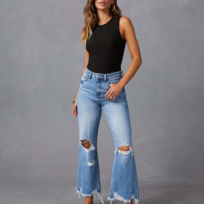 Watergewassen jeans met gaten hoge taille en ruwe wijde pijpen