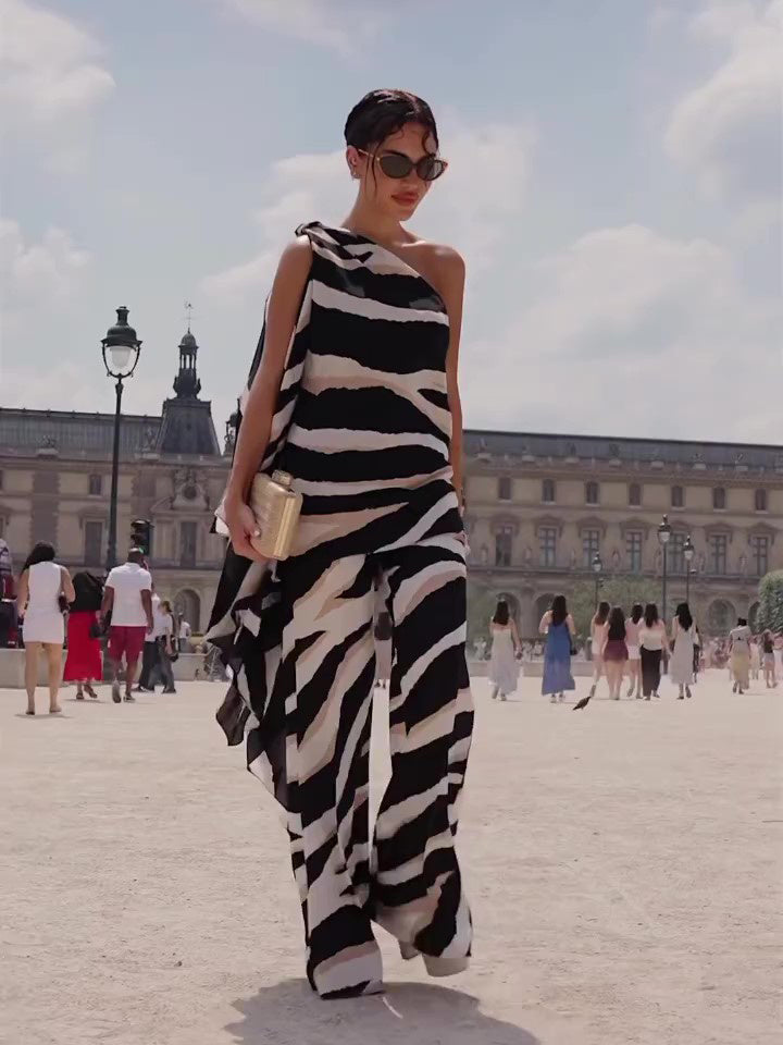 Zebraprint top met één schouder onregelmatige zoom wijde pijpen pak