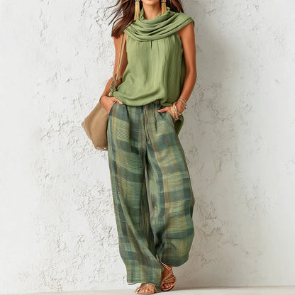 Sleeveless top with plaid pants