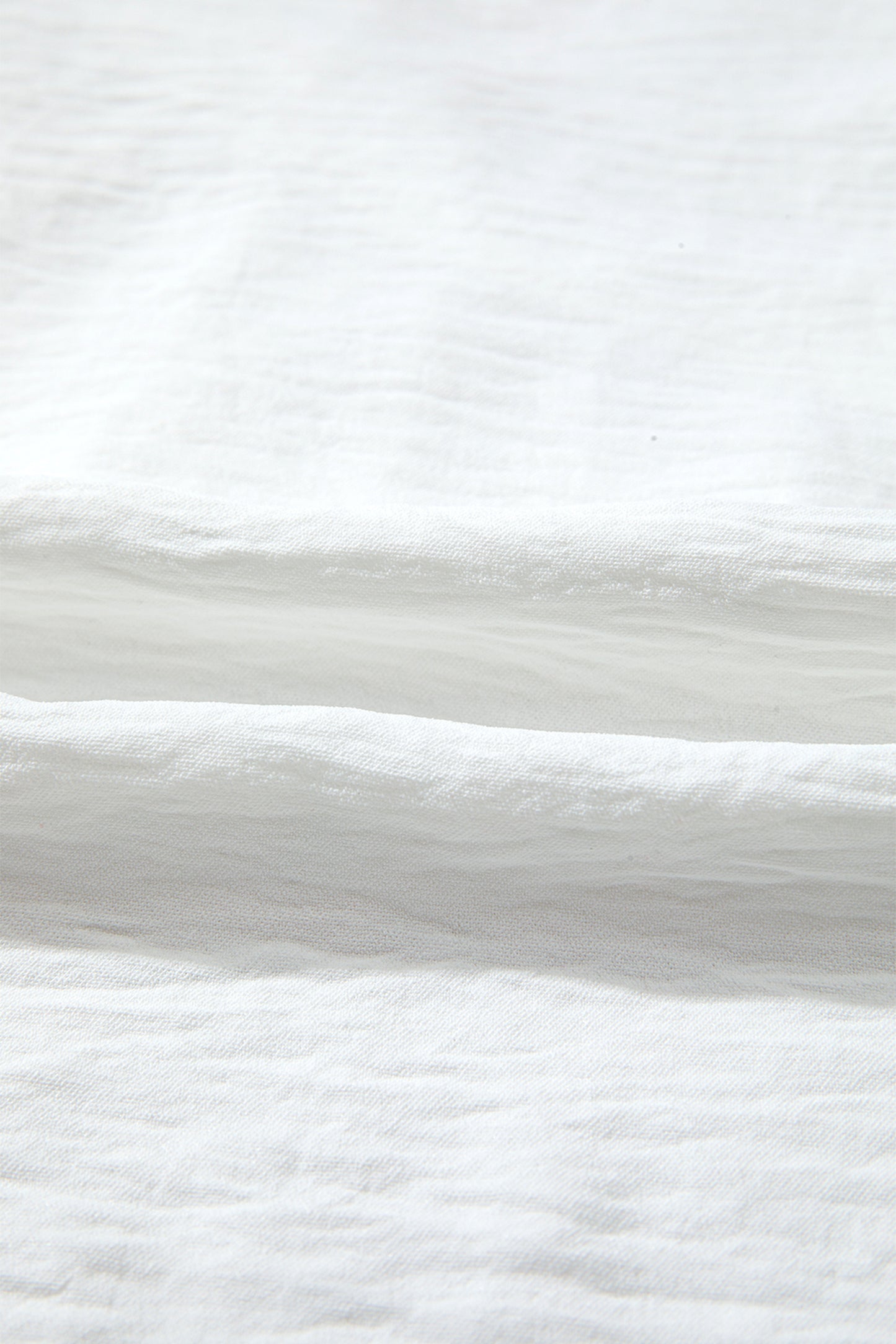 Witte blouse met lange mouwen bloemenmotief guipure kant en ruches