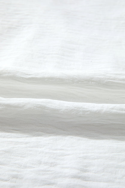 Witte blouse met lange mouwen bloemenmotief guipure kant en ruches