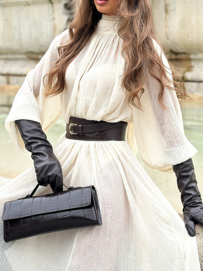 Witte maxi-jurk met lange mouwen volant en hoge strikhals