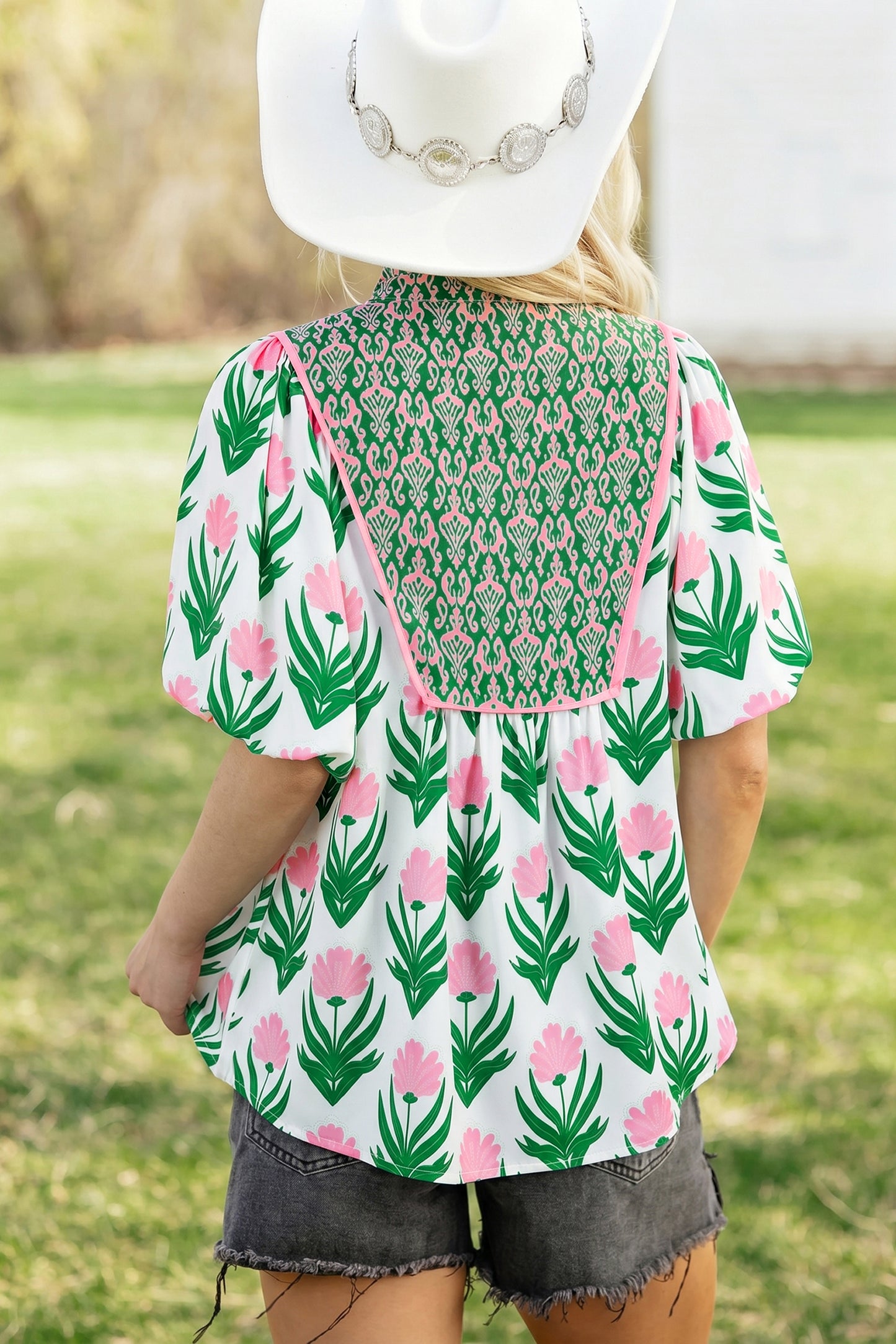 Blouse met veelkleurige bloemenprint pofmouwen contrasterende boord en V-hals
