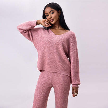 Gebreid geborsteld pak met lange mouwen en verzonken strepen