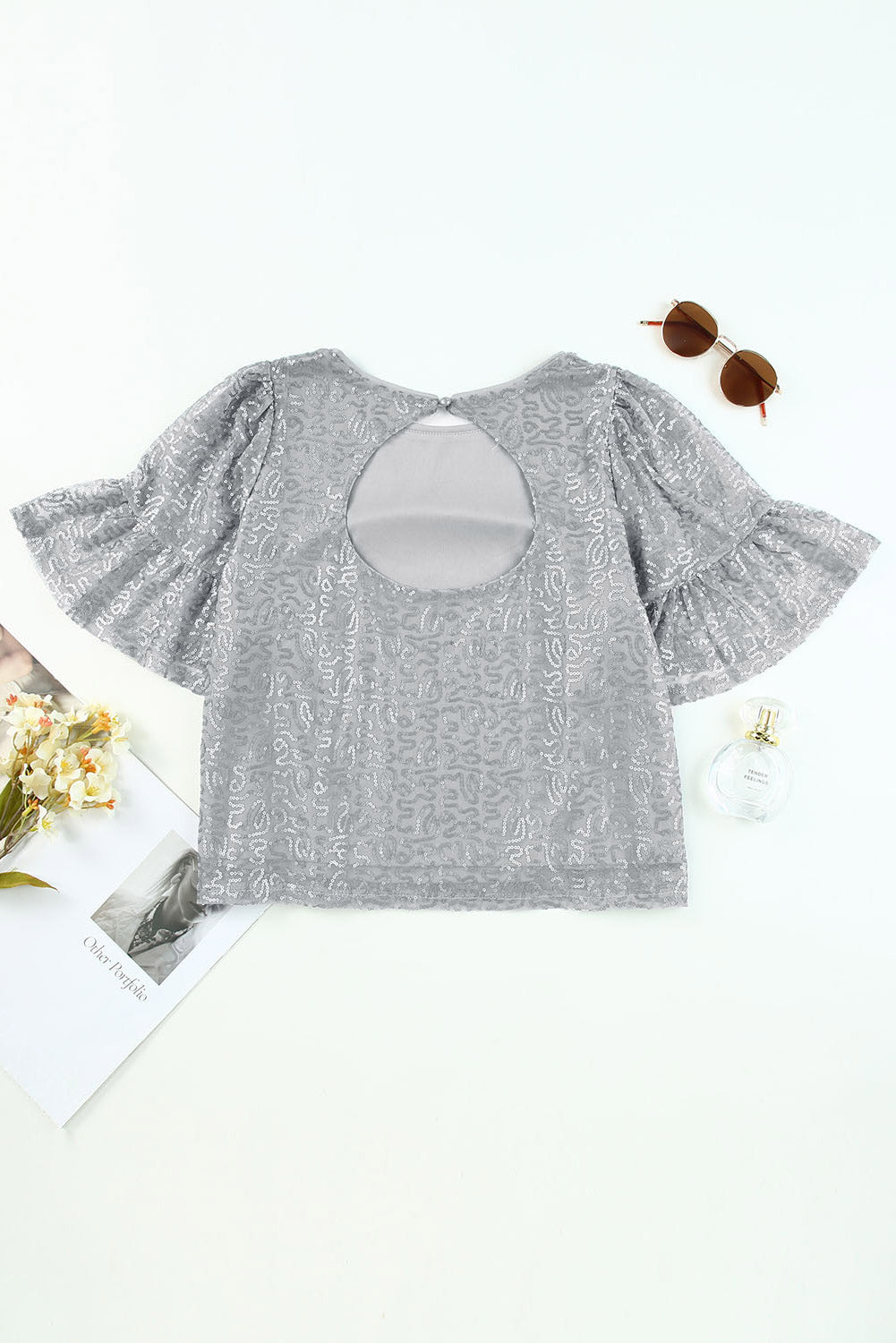 Grijze mesh blouse met ruchesmouwen en pailletten