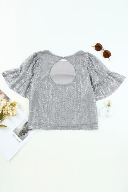 Grijze mesh blouse met ruchesmouwen en pailletten