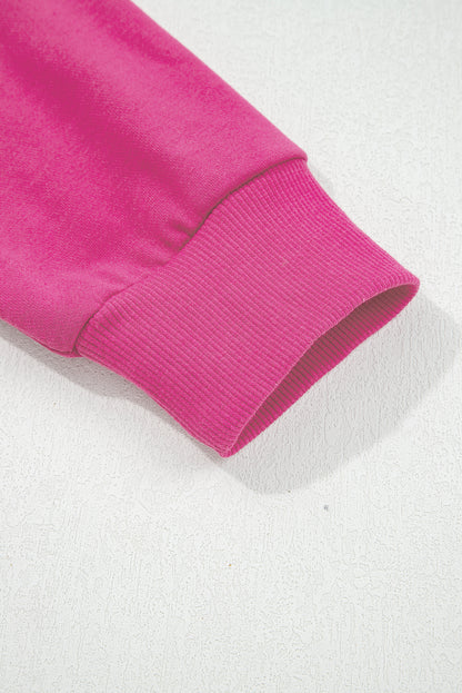 Preppy sweatshirt met strepen op de mouwen en een losse pasvorm